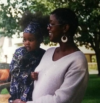 A childhood image of Chynna Rogers with her mother