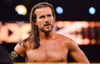 Adam Cole holds the nationality of America