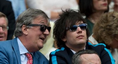 Elliott Spencers lovable partner Stephen Fry watching Wimbledon championship