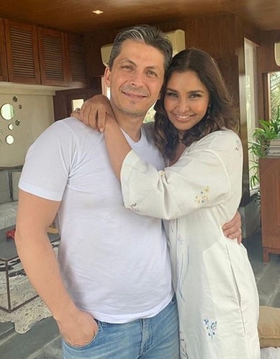 Jason Dehni and Lisa Ray posing for an Instagram picture