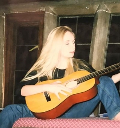 Jenna Karvunidis loves to play Guitar