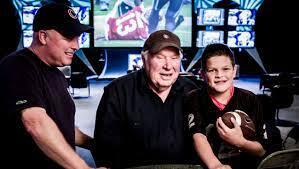 John Madden with his son