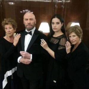 John Travolta with his sisters
