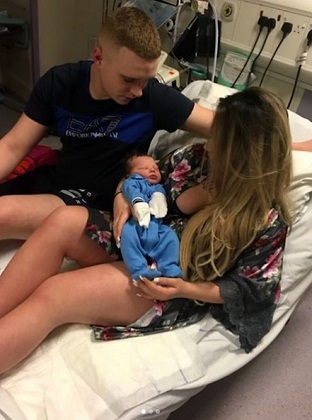 Louise McNamara with her partner and baby boy Kade Hudson