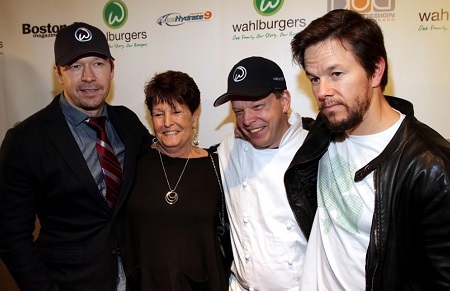 Mark Wahlberg with his mom and brother Donie and Paul