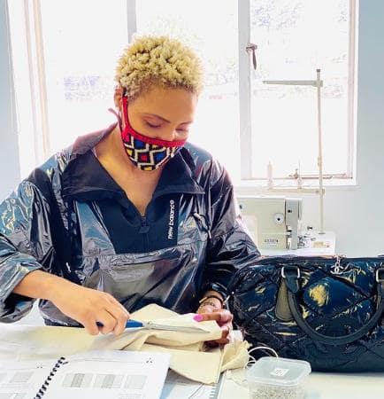 Norma Mngoma making the fashion garments in her own hands