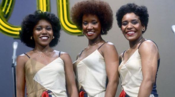 Pamela Hutchinson captured with her sisters Sheila Hutchinson and Wanda Hutchinson while performing on stage