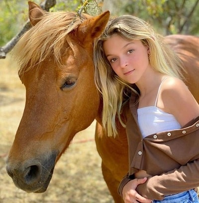 Sarah Dorothy Little picture with her favorite animal horse