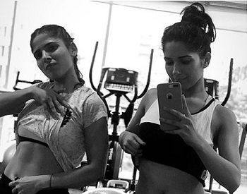 Sharma in the gym with her sister