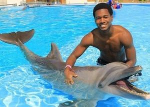Smith playing with a Dolphin