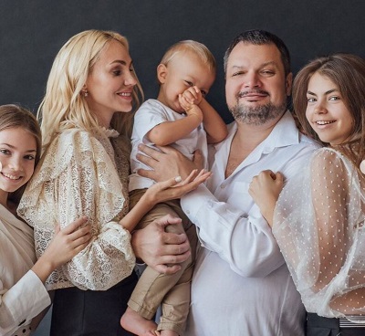 Zhenya Kotova with her family
